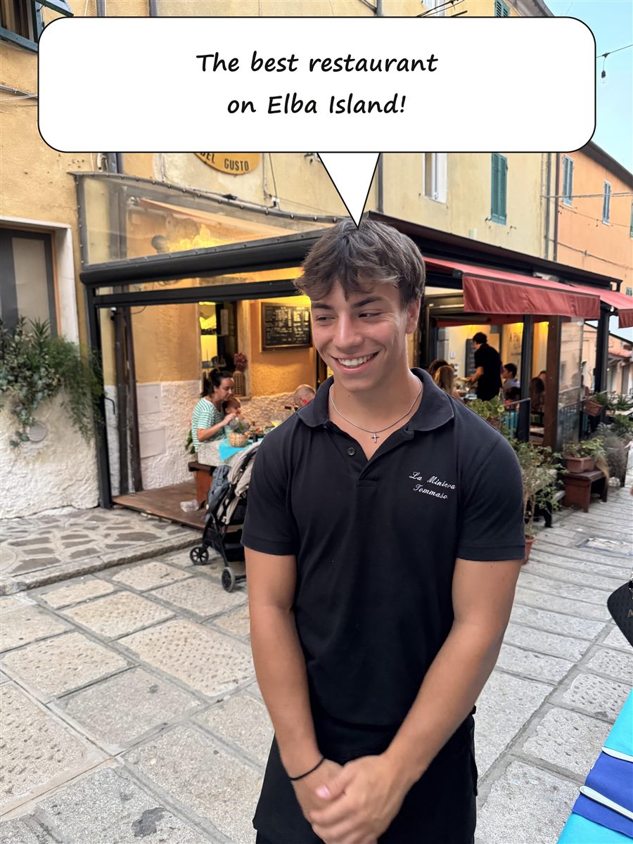 Tommaso, from the staff of La Miniera del Gusto, outside the restaurant